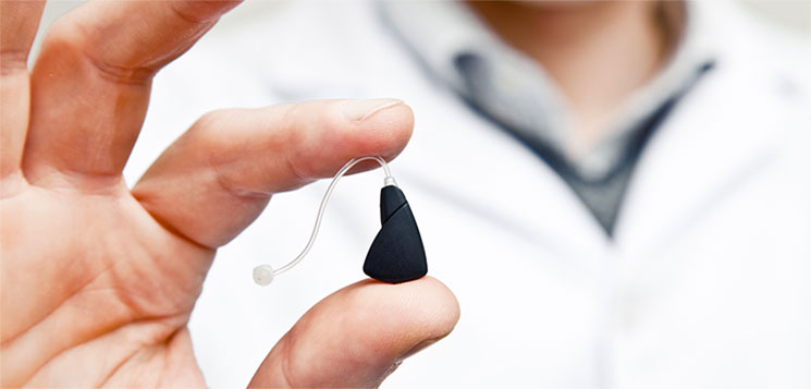 Hearing Aid in Hand