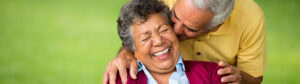 man kissing his wife