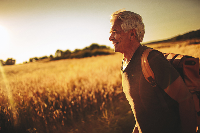 how often should hearing aids be replaced - Senior man hiking