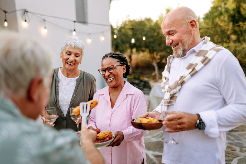 Group of middle age adults at a bbq